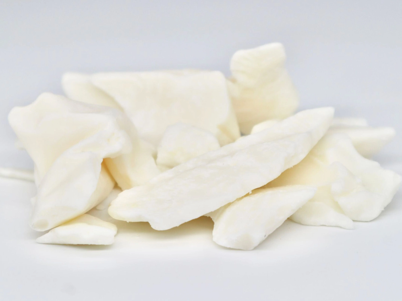 Refined Cocoa Butter with the creamy colour removed due to further processing Radad International