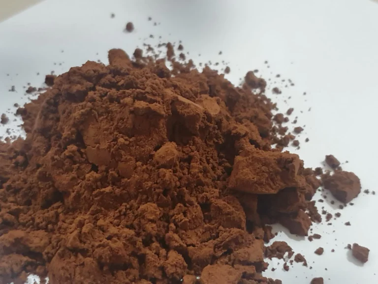 Alkalized cocoa powder, dark brown in colour , used for baking and other food related things | Radad International